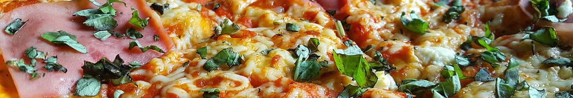 Eating Chicken Wing Fast Food Pizza at Guido's Pizza & Pasta restaurant in Van Nuys, CA.